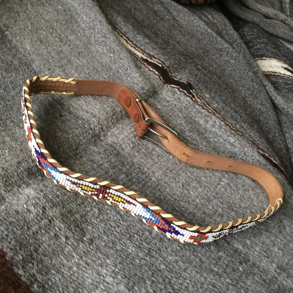 Vintage beaded belt size 26. Firebird design.